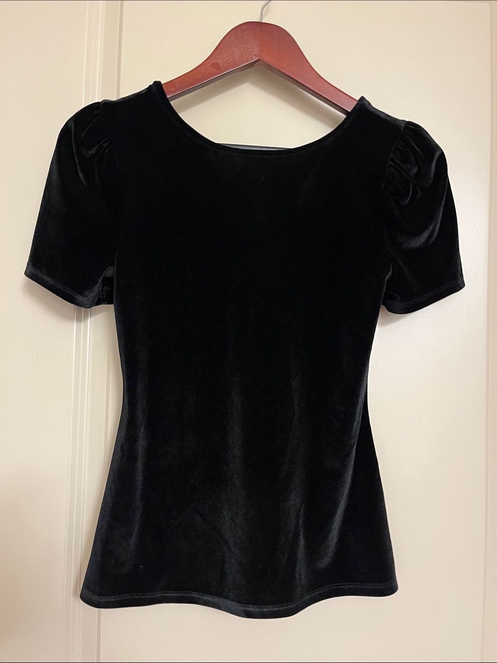 Women's Black Velvet Short Sleeve Scoop Neck Top with puff sleeves.